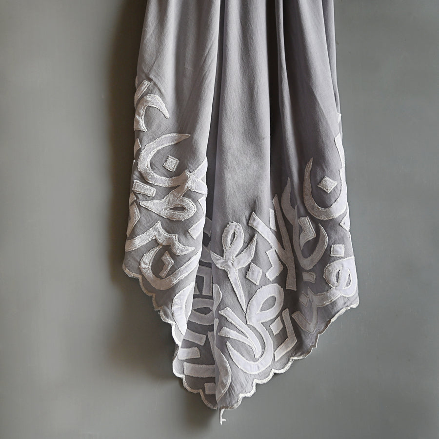 
                  
                    Ash & White Velvet Applique Work Calligraphy Scarf
                  
                