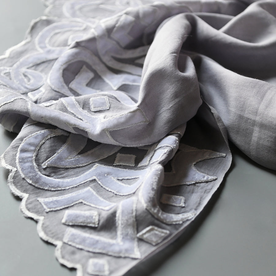 
                  
                    Ash & White Velvet Applique Work Calligraphy Scarf
                  
                