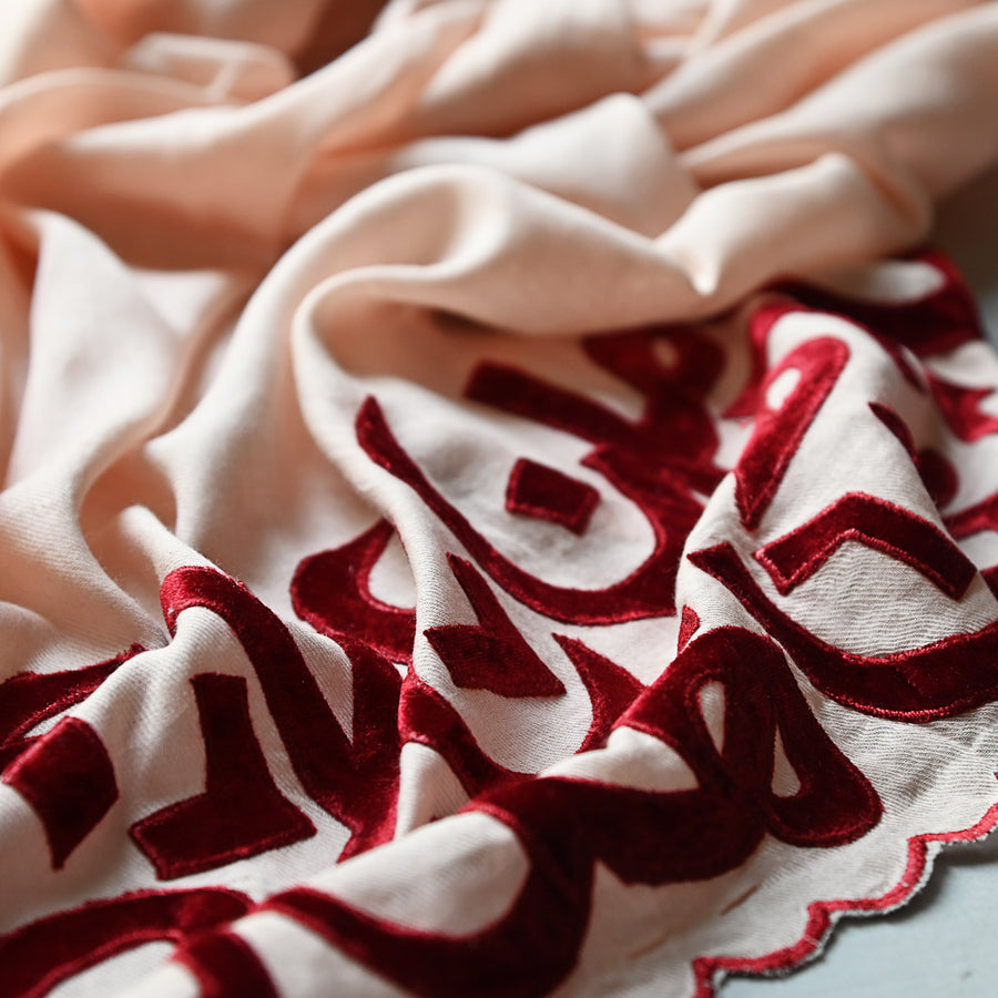 
                  
                    Peach & Red Velvet Applique Work Calligraphy Scarf
                  
                