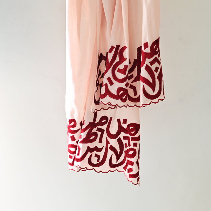 
                  
                    Peach & Red Velvet Applique Work Calligraphy Scarf
                  
                